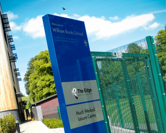 Image of monolith sign in situ at a school